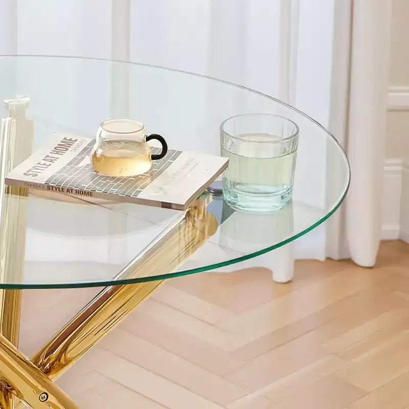 Mesa de comedor de cristal con patas metálicas cruzadas - Ahorra espacio, moderna