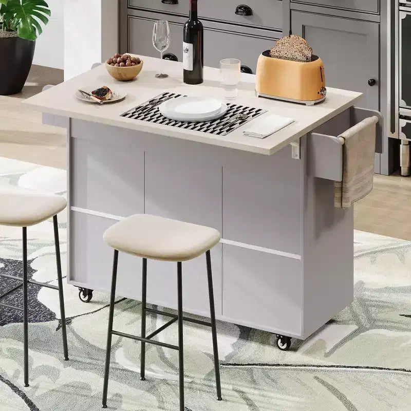 Isla de cocina blanca con carrito de cocina con ruedas, almacenaje para cubo de basura, hoja desplegable y estante ajustable